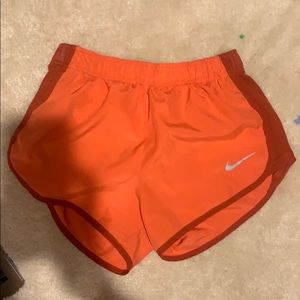 Orange Nike shorts